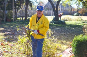 Disaster Relief Blue Cap Jack McAlester helps remove tree limbs. (Photo: Chris Doyle)